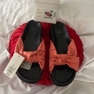NEVER WORN Women’s size 11 slide Coral Sandals.